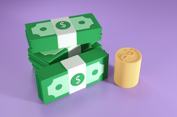 stack of dollar bills and coins